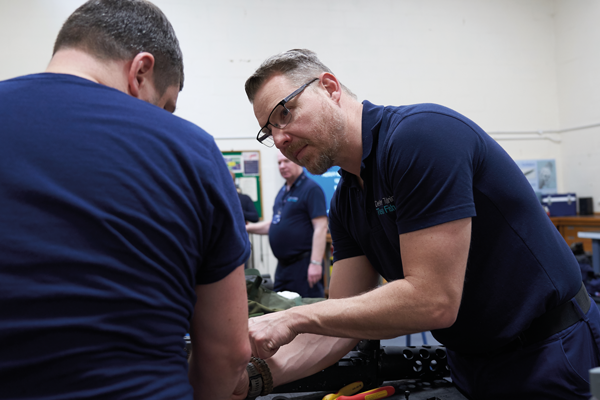 Trainer talking to a student